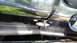 1996 Ford Bronco - Detail of a chrome push bar mounting bracket, showing hardware and attachment points.