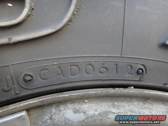 Tire sidewall with DOT code CAD06120 indicating manufacture in the 6th week of 2020