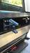 1996 Ford Bronco - Shaved off rust and repainted the tire arm holder.