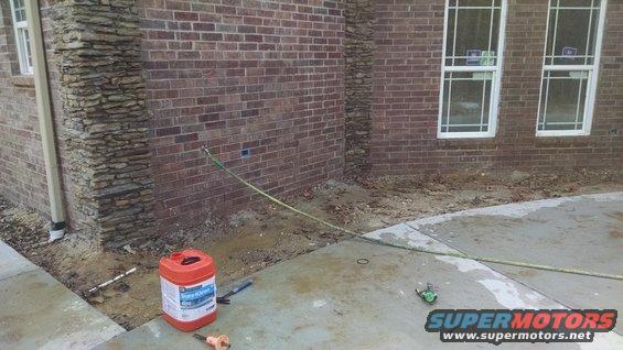 img_20161107_152541534.jpg The mason is acid-washing the brick, but it's going to take at least another pass to remove all the extra mortar.