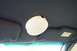 2001 Ford Crown Victoria - Overhead interior light and sun visor with a warning sticker are visible.