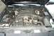 2001 Ford Crown Victoria - The engine bay of a 2001 Ford Crown Victoria is shown with the hood open.