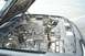 2001 Ford Crown Victoria - The engine bay of a 2001 Ford Crown Victoria is visible with the hood raised.