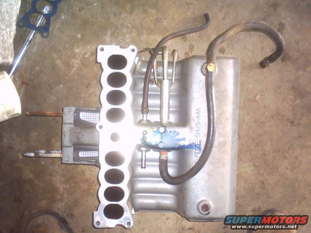 Intake manifold with hoses and readable text FUZE-9425-A4A