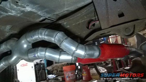 Custom exhaust Y-pipe and red muffler