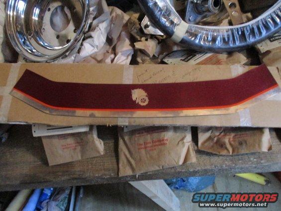Maroon decal with orange trim and a horse head logo with a wheel