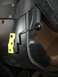 1986 Yamaha BLASTER - A black lever with a round knob is visible, along with yellow stickers depicting stick figures.