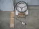1986 Yamaha BLASTER - A steering wheel and shaft are laid out on a concrete surface with packaging materials, suggesting they are parts for sale or storage.