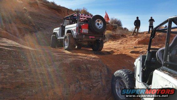 1979 Ford Bronco on rocky trail, rear view