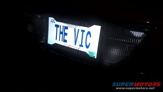 License plate reading "THE VIC" on a dark vehicle