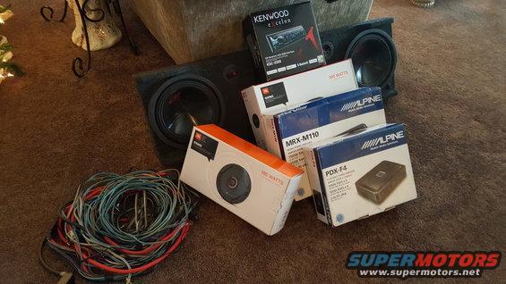 Car audio gear including subwoofers, speakers, amplifier, and wiring