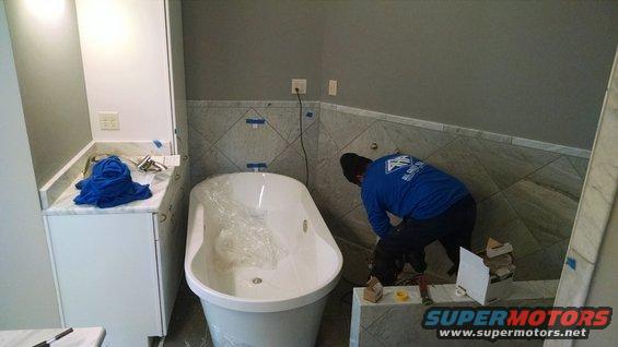 img_20161209_143636537.jpg While the landscapers worked outside, the plumbers worked inside.  The pool drain had to be moved a few inches, and its hole filled with cement.