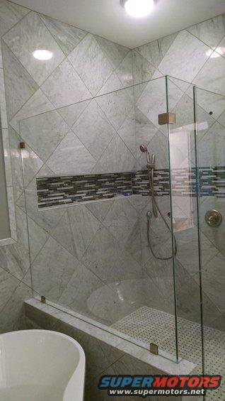 img_20161216_154741136.jpg The shower enclosure was installed today, but they forgot the door sweep and handle, so they have to come back next week.