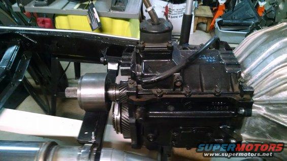 Jeep transmission and transfer case assembly with shifter. Part numbers visible