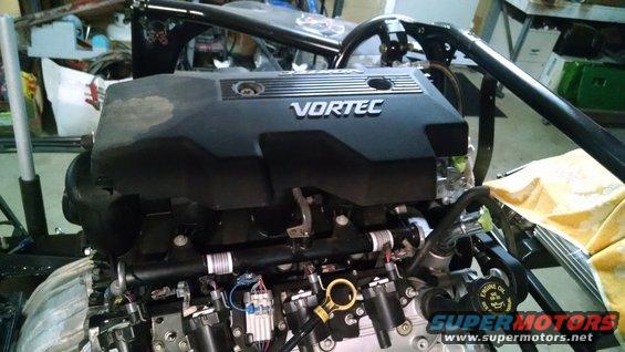 Vortec engine with black valve covers and visible wiring harnesses