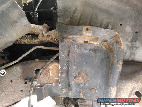 Rusted shock tower and exhaust pipe with heat wrap