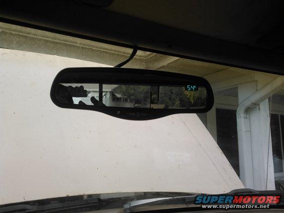 the rear view mirror showing temperature outside. for being in Florida its pretty chilly outside