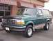 1996 Ford Bronco - This green Ford Bronco, with its distinctive body style, appears to be from the early to mid-1990s, not a 1996 model.