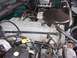 1996 Ford Bronco - Engine bay detail of a Ford 5.8L V8, likely from a 1996 model year vehicle.