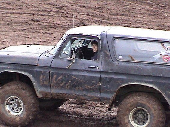 mountain-mud-fest-2004-011.jpg Jim has handed over the wheel to his son Michael for a trip thru the obstacle course