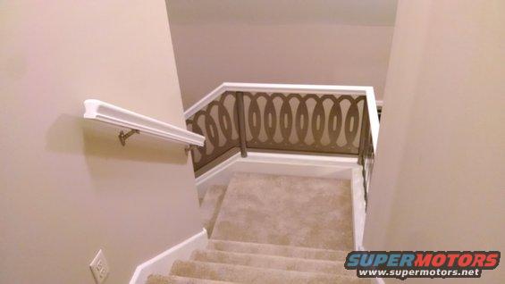 img_20170118_215623437.jpg The upper flight handrail is just attached to the wall studs.