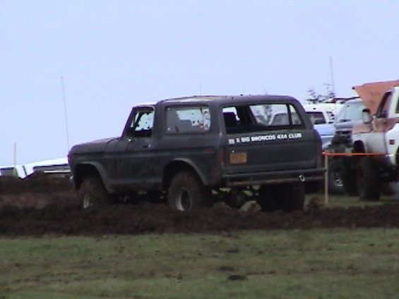 mountain-mud-fest-2004-094.jpg Jim is letting Michael try out the obstacle course