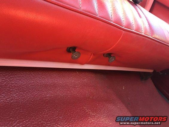 Cup holder bolts through the vinyl