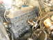 1995 Ford F-150 - Engine components including the block, valve covers, and spark plugs are shown in detail.