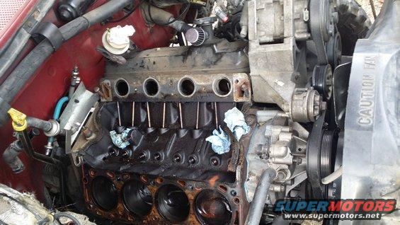20170218_155840.jpg Getting there. Intake gaskets have been leaking for some time. I am surprised at how clean the valley looks.