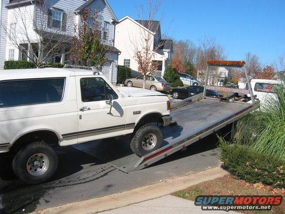 img_0288.jpg Gettin towed to the temporary garage...a 2 bay storage unit rented for 280 a month...2 weeks was 140 bucks...much cheaper than paying someone to do all this work since I did not have a garage...