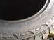 2014 Ford F-150 - This image shows the sidewall of a tire with its size and load rating clearly visible.