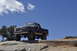 1991 Ford Bronco - This lifted 1991 Ford Bronco navigates a rocky trail under a clear blue sky.