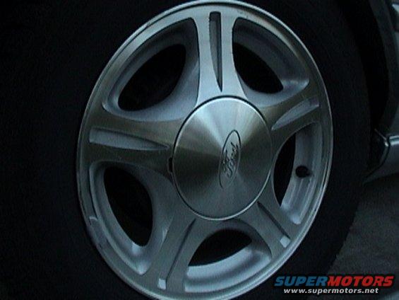 dsc00026.jpg 15" 1999 taurus se rims on arizonian tirs