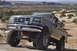1991 Ford Bronco - This lifted 1992 Ford Bronco navigates a rocky desert landscape.