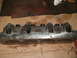 1964 Ford Galaxie - Engine cylinder head with valve springs is shown, likely a replacement part.
