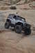 1991 Ford Bronco - This modified Jeep Wrangler JK navigates a challenging rocky terrain.