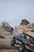 1991 Ford Bronco - This 1991 Ford Bronco navigates a steep, rocky trail in a desert landscape.