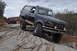 1991 Ford Bronco - Off-roading adventure in Moab with a 1991 Ford Bronco and a Jeep on a challenging rocky path.