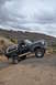 1991 Ford Bronco - Ford Bronco navigates a challenging rocky terrain off-road.