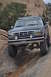 1991 Ford Bronco - This modified Ford Bronco navigates a rocky trail, its off-road capabilities.
