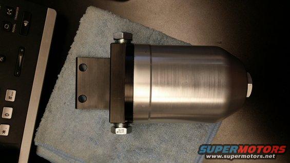 20170421_123026.jpg One of the previous owners cut a 2 foot section of fuel line out to plumb in an auxiliary tank (massively over cut). The truck currently sports regular fuel hose in its place until I can make a more permanent solution i.e. plumbing this fuel filter from TrickFlow in its place using steel line, not hose.