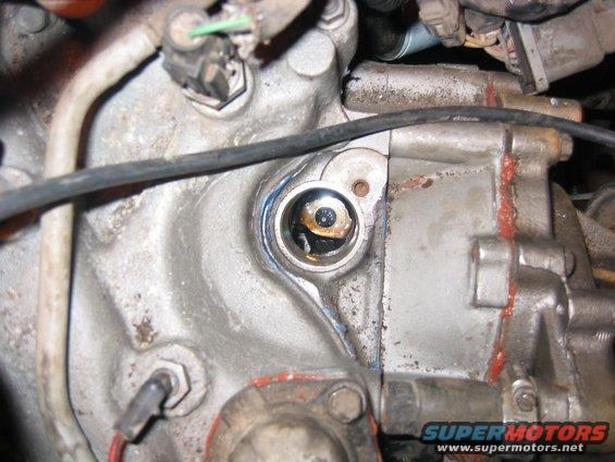 img_0328.jpg Oil pump driveshaft is in the middle...a dropped socket might be disastrous, so be careful and tape the crap out of it to the extension.