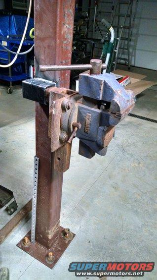 img_20170425_245508382_hdr.jpg I thought about making this height-adjustable, but I couldn't think of a way to do it that I thought would take the stress.  So I just welded a short piece of receiver tube to the column to accept the vise's portable mount that I built a few years ago to fit into my truck's bumpers. 

Later, I put a [url=https://www.amazon.com/dp/B001VY07LQ]Ridgid F45[/url] on the mount here.