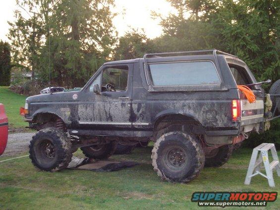 1993 Ford Bronco side view, lifted with large tires