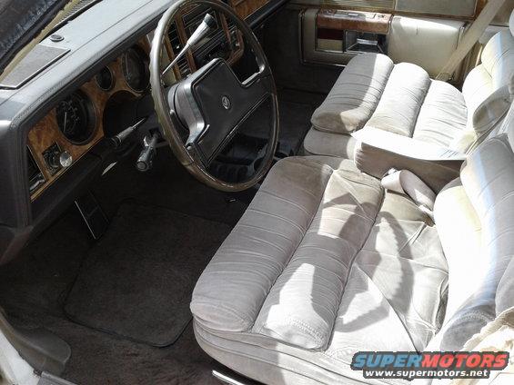 1984 Buick Electra interior with velour seats and woodgrain trim