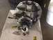 1982 Ford Bronco - A differential housing and yoke are shown, likely a replacement part for a vehicle.