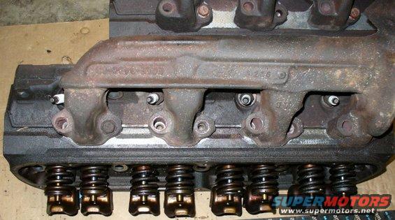 gt40pmanifold-fit-test-(pass).jpg Passenger side stock manifold on GT40P head. Easy spark plug access.