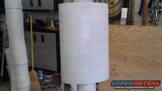 Final primer coat on muffler.  The lines are from my lighting