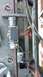 2016 Ford F-250 - A winch mechanism is attached to the diamond plate surface of a trailer.