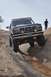 1991 Ford Bronco - This 1991 Ford Bronco is navigating a challenging off-road course on a rocky terrain.
